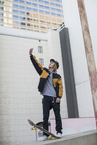 Young man skateboarding.