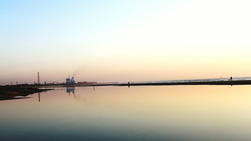 Scenic view of sea at sunset