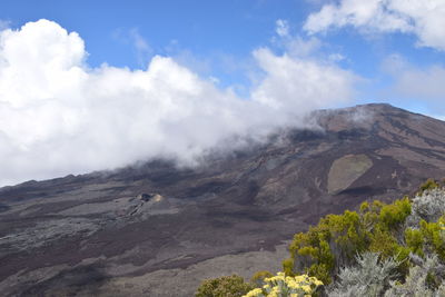 Scenic view of mountain range against sky