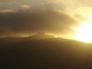 Scenic view of landscape against sky during sunset