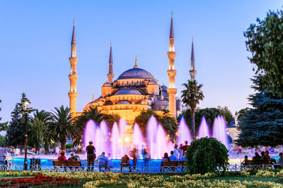 People in front of sultan ahmed mosque at dusk