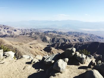 Scenic view of landscape and mountains against sky