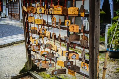 Close-up of information sign for sale