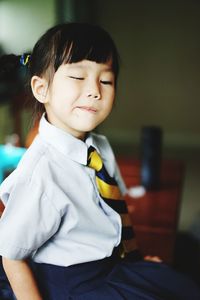 Cute girl sitting on mobile phone