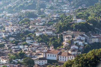 High angle view of townscape and trees