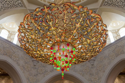 Low angle view of multi colored glass on ceiling