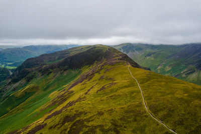 Aerial summer view in cloudy catbells walking route, lake district, united kingdom