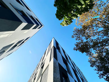 Low angle view of skyscraper against sky