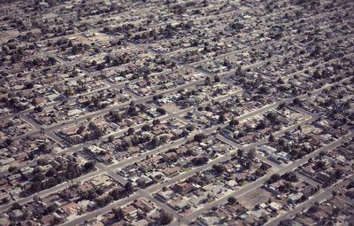 Aerial view of american suburban houses neatly arranged in cul-de-sac streets.