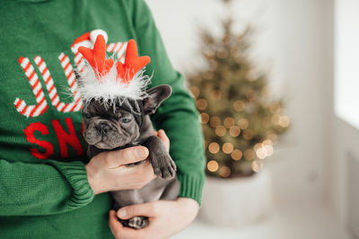 Midsection of woman with dog