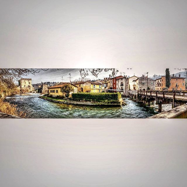 clear sky, built structure, architecture, copy space, building exterior, water, transportation, river, bridge - man made structure, house, connection, outdoors, no people, day, winter, waterfront, canal, nature, residential building, residential structure