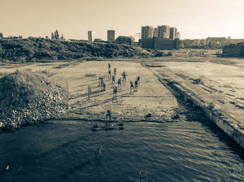 High angle view of people by buildings in city