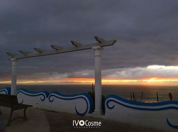 Scenic view of beach against sky during sunset