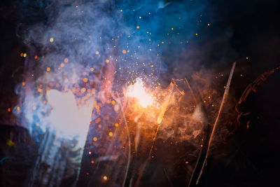 Firework display at night