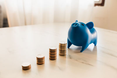 Close-up of coins on table