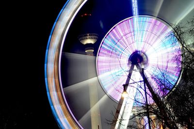 Low angle view of ferris wheel