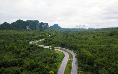 Scenic view of mountain road against sky