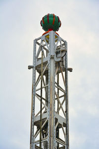 Low angle view of water tower against sky