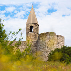 Low angle view of old building against sky