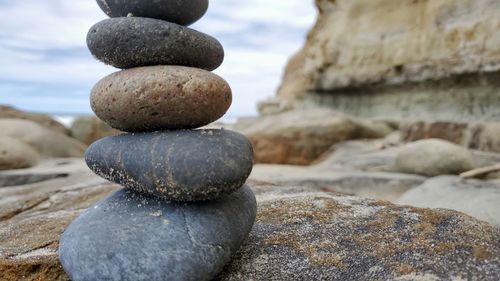 Close-up of stone stack on rock