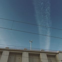 Low angle view of building against blue sky