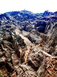 Aerial view of mountains against clear sky