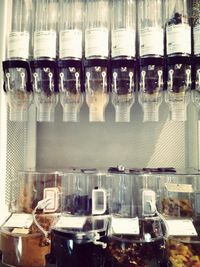 Full frame shot of wine bottles on restaurant table