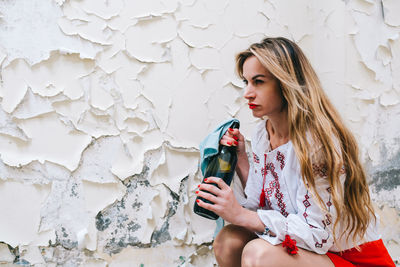 Young woman using mobile phone