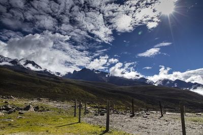 Scenic view of snowcapped mountains against sky