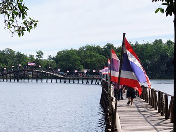 Scenic view of bridge over river against sky