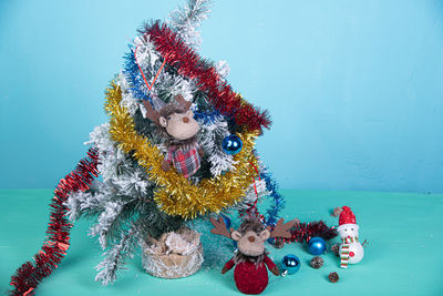 Woman with christmas decoration in winter