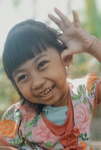 Close-up portrait of smiling child