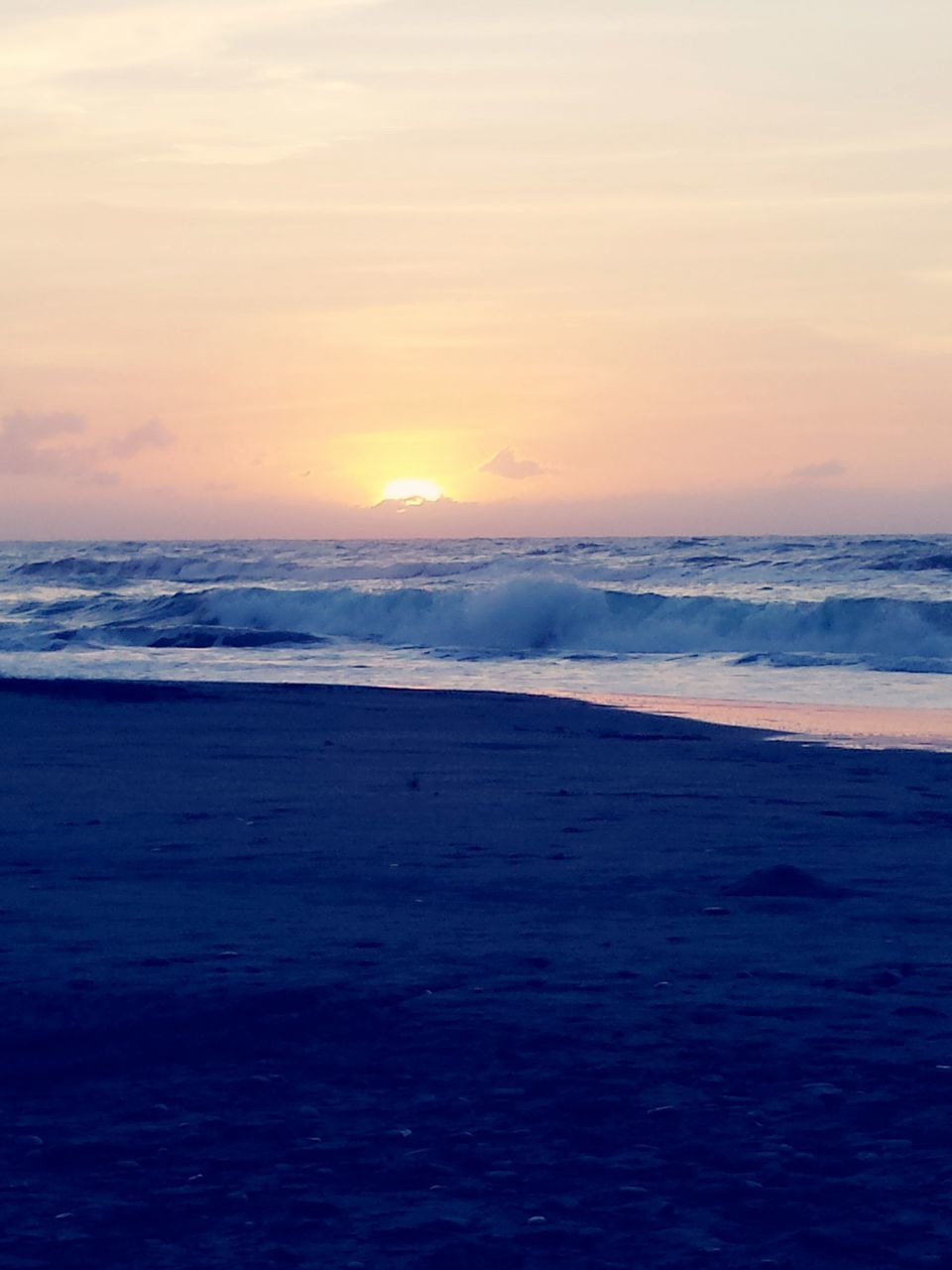 sea, horizon over water, water, beach, sunset, scenics, tranquil scene, beauty in nature, tranquility, shore, wave, sky, nature, idyllic, orange color, sand, seascape, surf, remote, outdoors