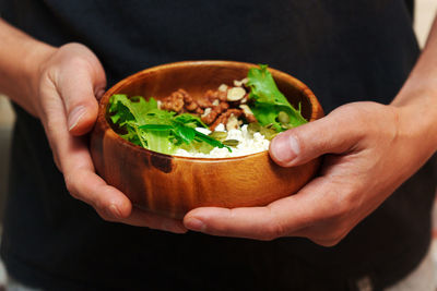 Close-up of hand holding food