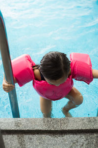 High angle view of girl in swimming pool