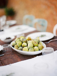 Close-up of fruits in bowl on table