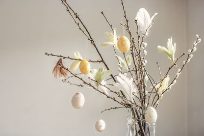 Twigs with hanging easter eggs