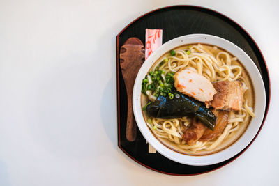 Close-up of soup served on table