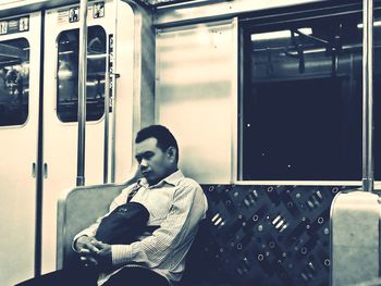 Man sitting in train