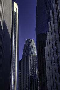 Low angle view of skyscrapers against sky