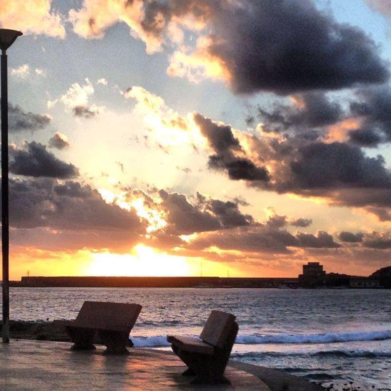 SCENIC VIEW OF SEA DURING SUNSET