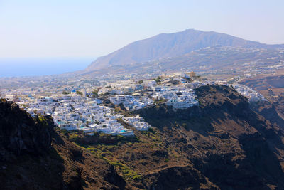 Aerial view of landscape and mountains against sky