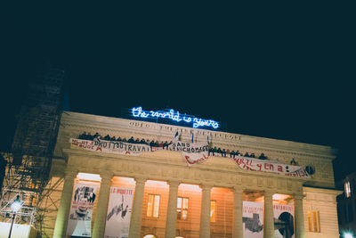 Low angle view of text on wall