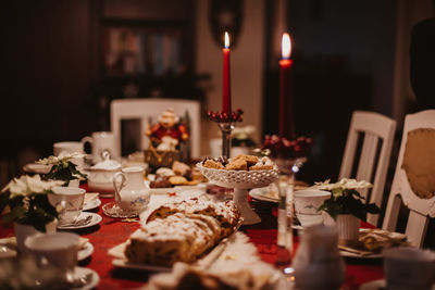 Close-up of cake with decorations on table during christmas