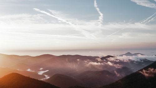 Scenic view of mountains against sky during sunset