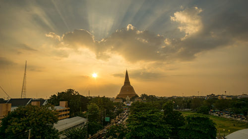 Panoramic view of buildings against sky during sunset