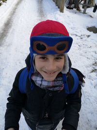 Portrait of boy in snow