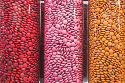 Full frame shot of colorful chocolate in bottle