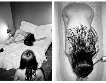 High angle view of woman relaxing on bed at home