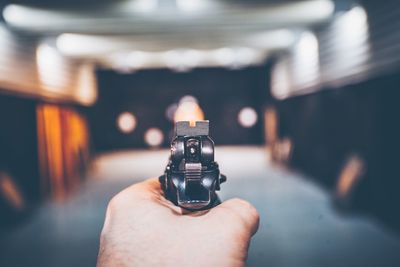 Close-up of hand holding camera